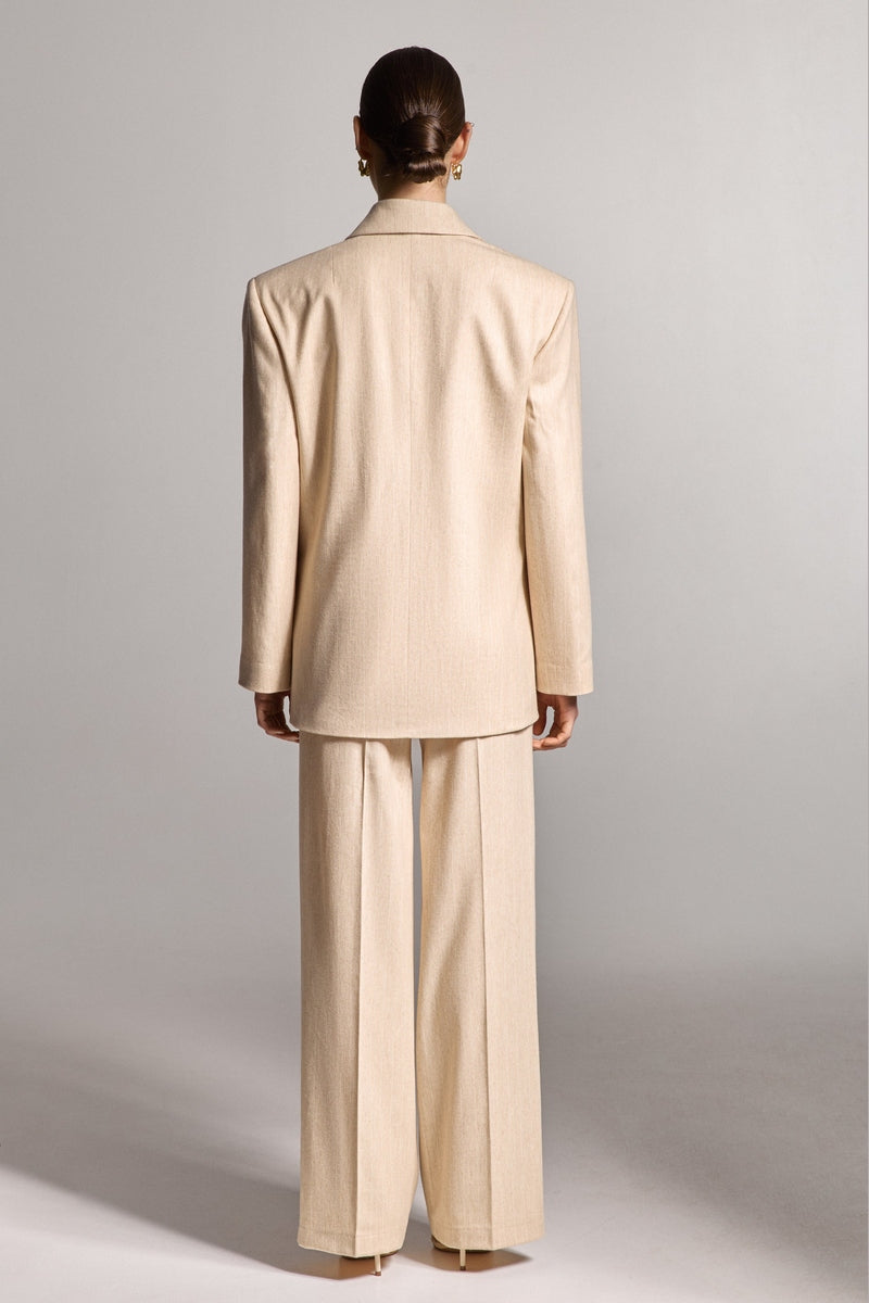 Брюки бежеві в білу смужку