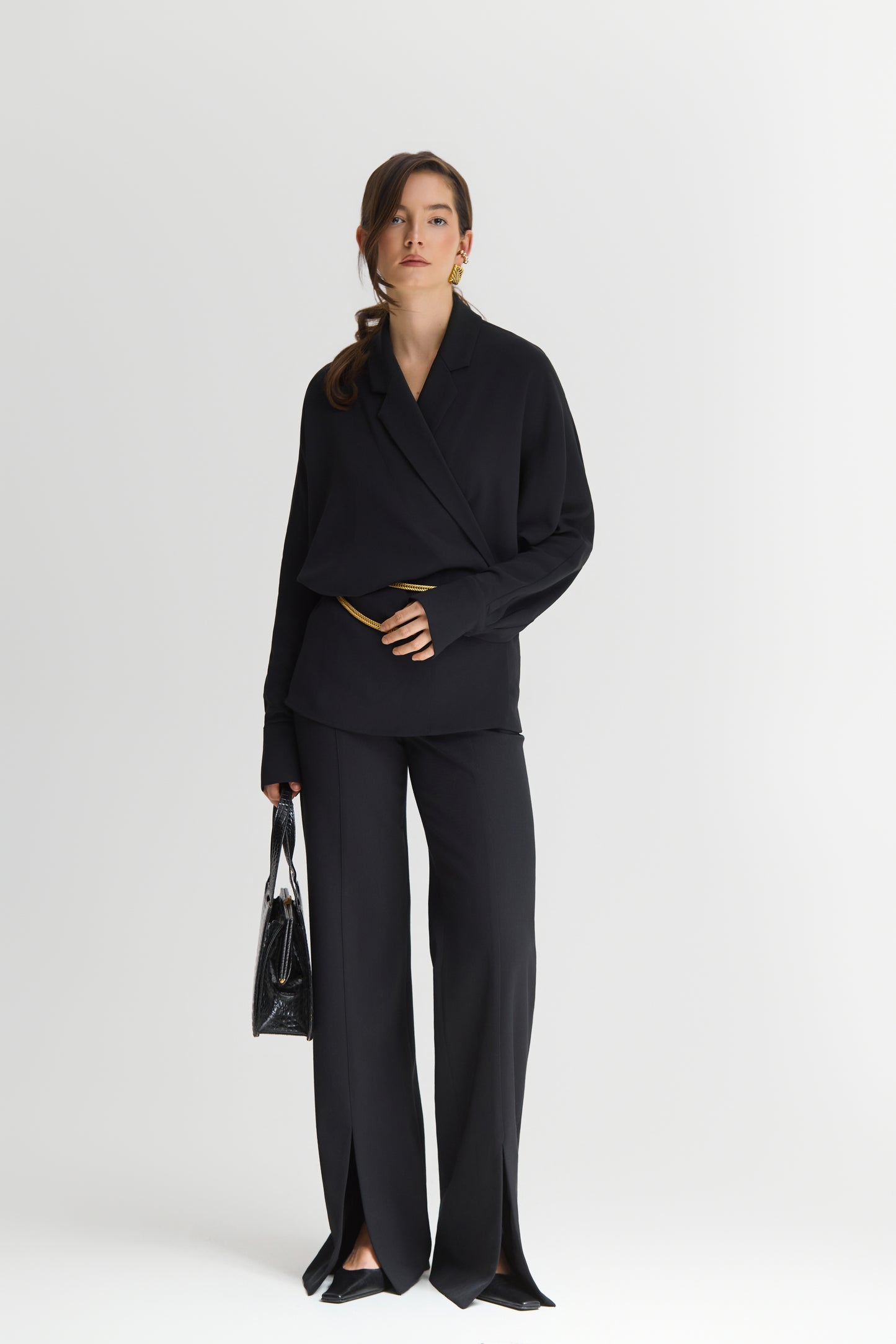 Чорні брюки з розрізами